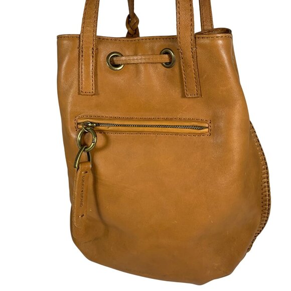 Vintage FOSSIL Camel Tan Leather Drawstring Bucket Shoulder Bag Tassel Charm - Picture 3 of 16